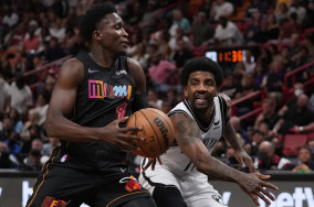 Nets hand slumping Heat fourth straight loss