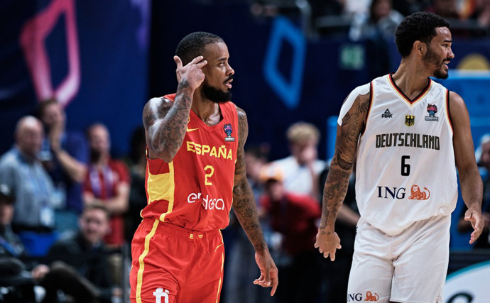 Spain beats Germany in close battle behind Brown and Schroder's masterpieces